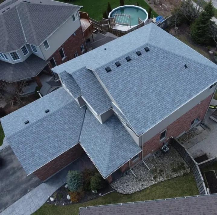 Roof repair with flashing and ridge vent installation